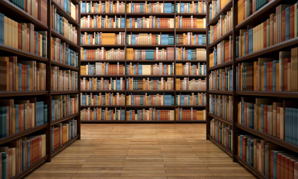 Looking-down-library-isle-at-wall-of-books